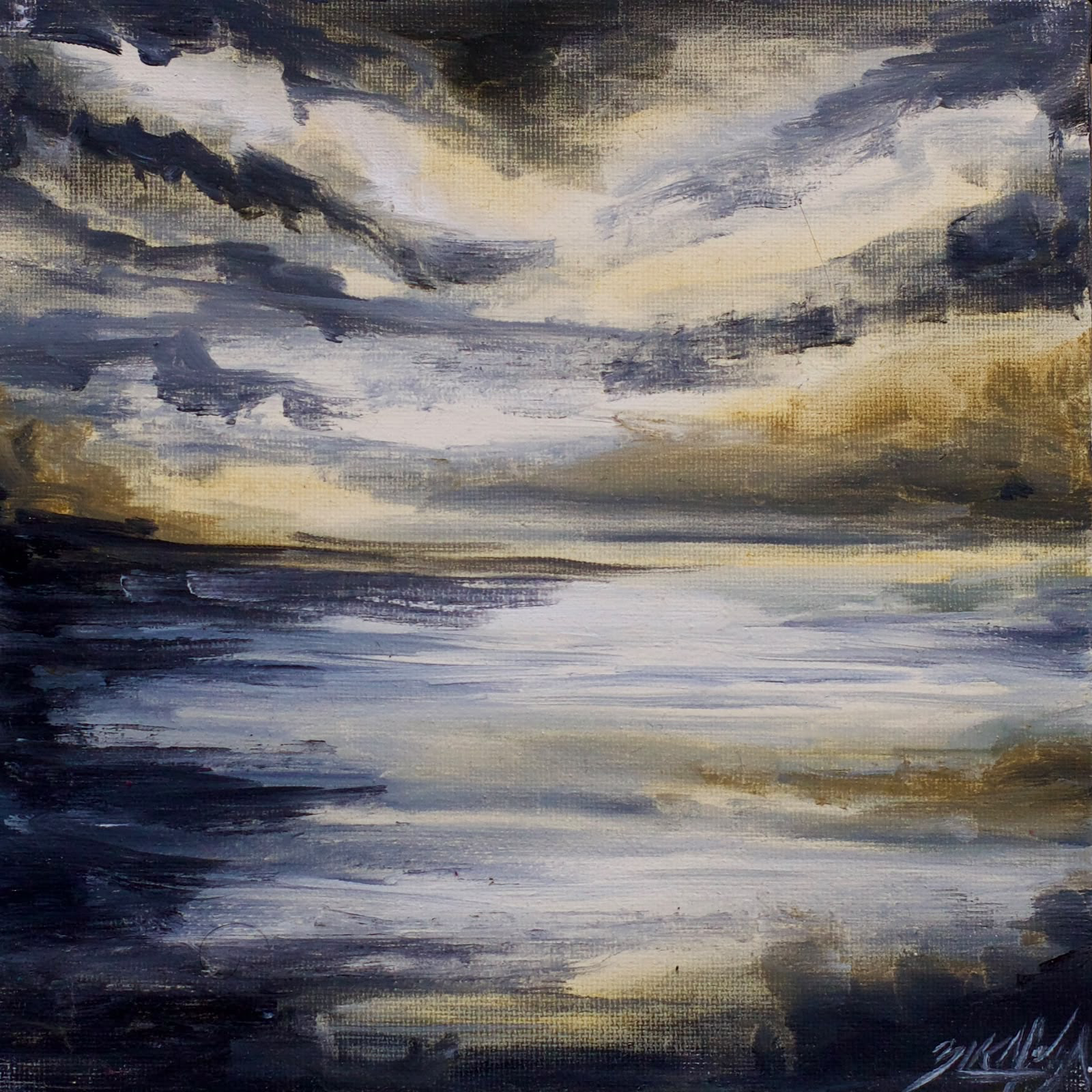 Sky and water in shades of blue, grey and gold